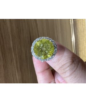 Fancy yellow 9.44 carat round diamond ring