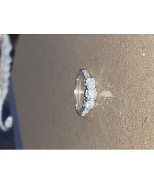 1.5 ct three stone diamond engagement ring with sidestones 