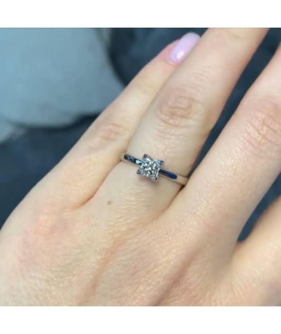Half carat Princess shape engagement ring.